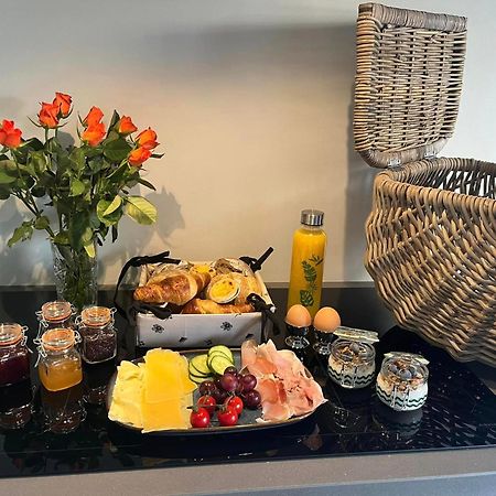 Bed & Breakfast+ De Kooimolen Dreumel Bagian luar foto