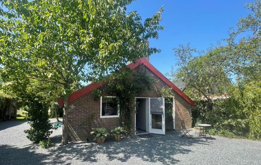 Bed & Breakfast+ De Kooimolen Dreumel Bagian luar foto